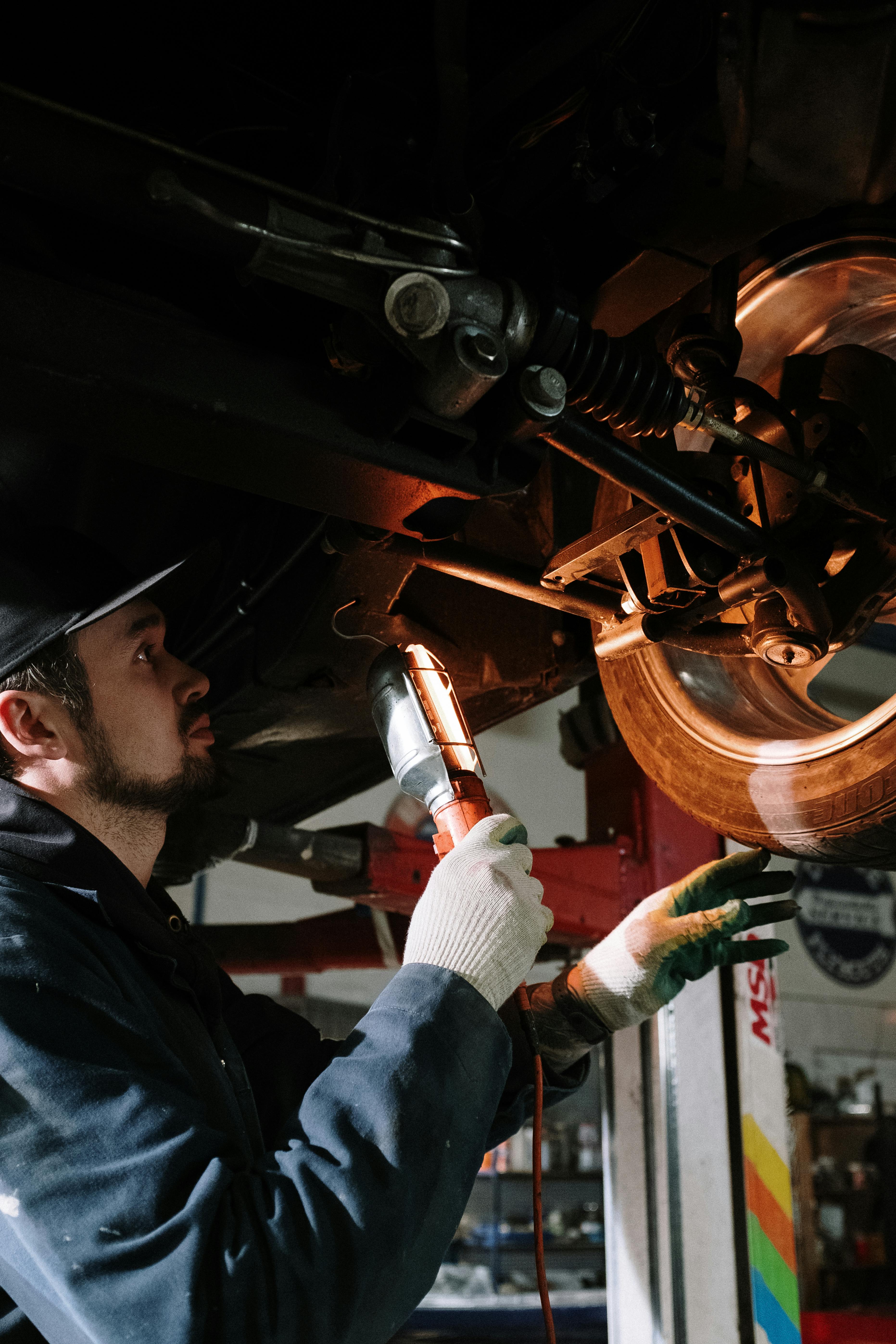 Mechanic repairing car in Aurora IL